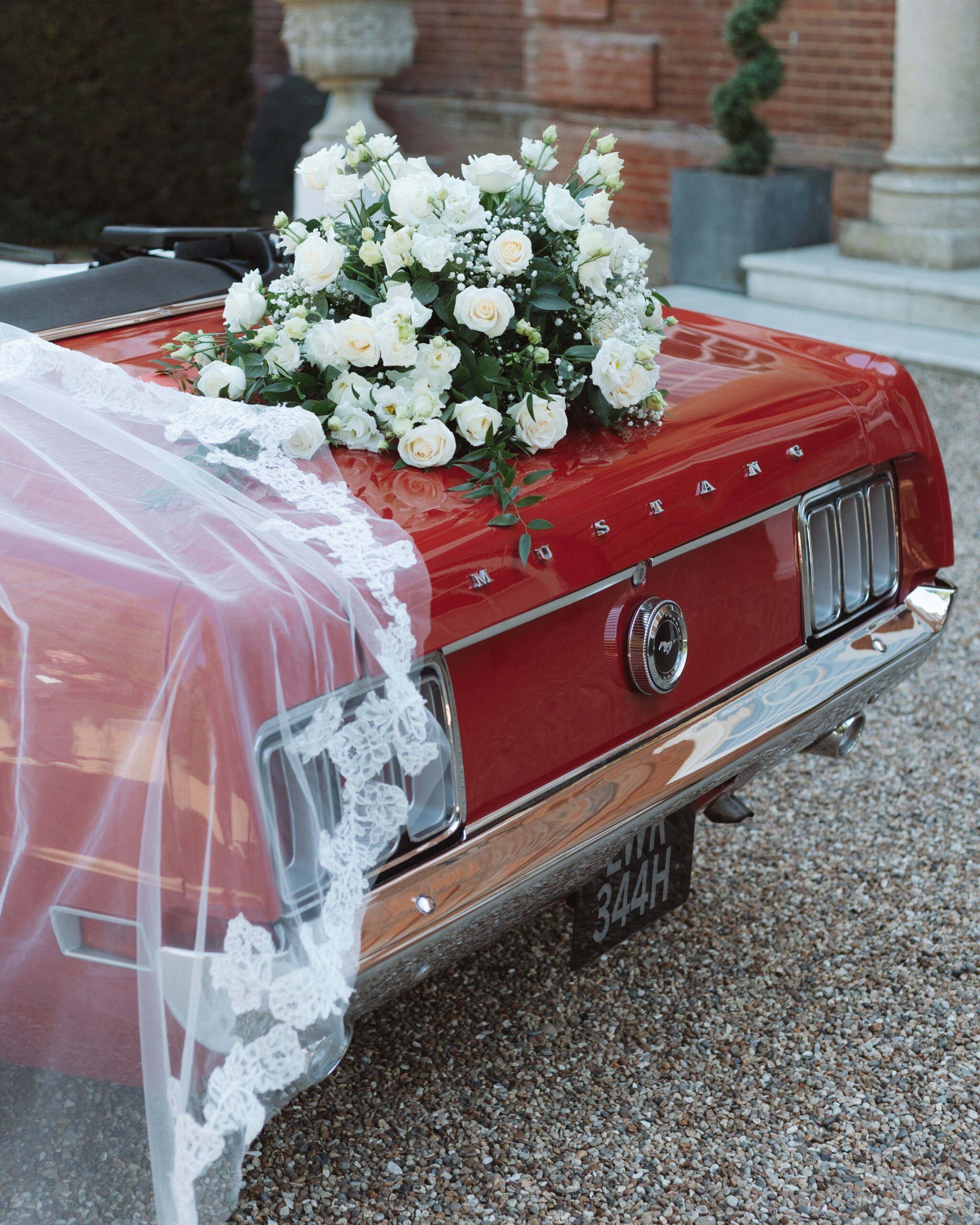 Classic wedding car with flowers